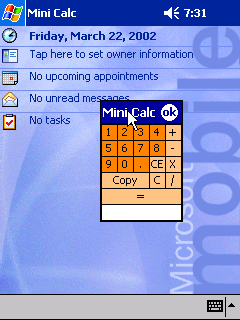 Mini Calculator floating above another application on a Pocket PC